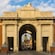 Façade of the Menin Gate with a stone archway and 3 lion statues in Ypres, Belgium